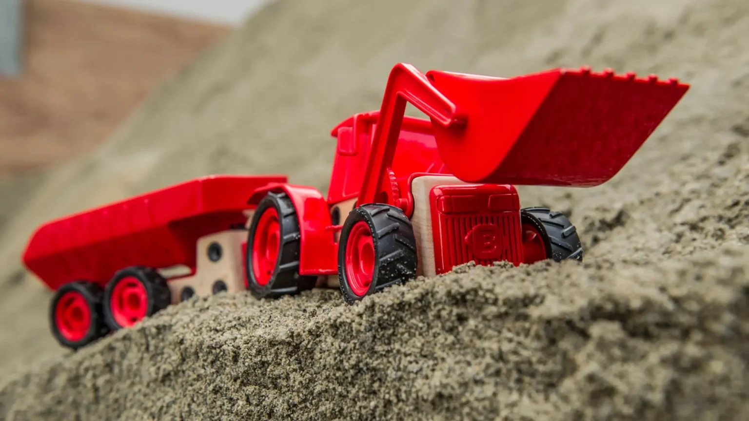 Beljo toy design of a tractor in the sand