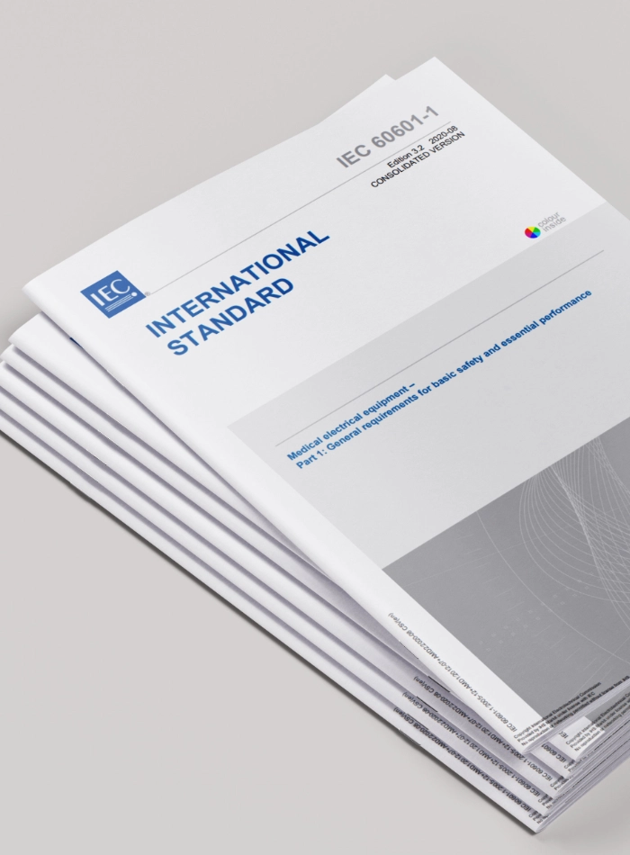 An image of a stack of regulatory documents for medical design